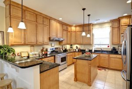 Painting or staining how to make your kitchen cabinets look new again